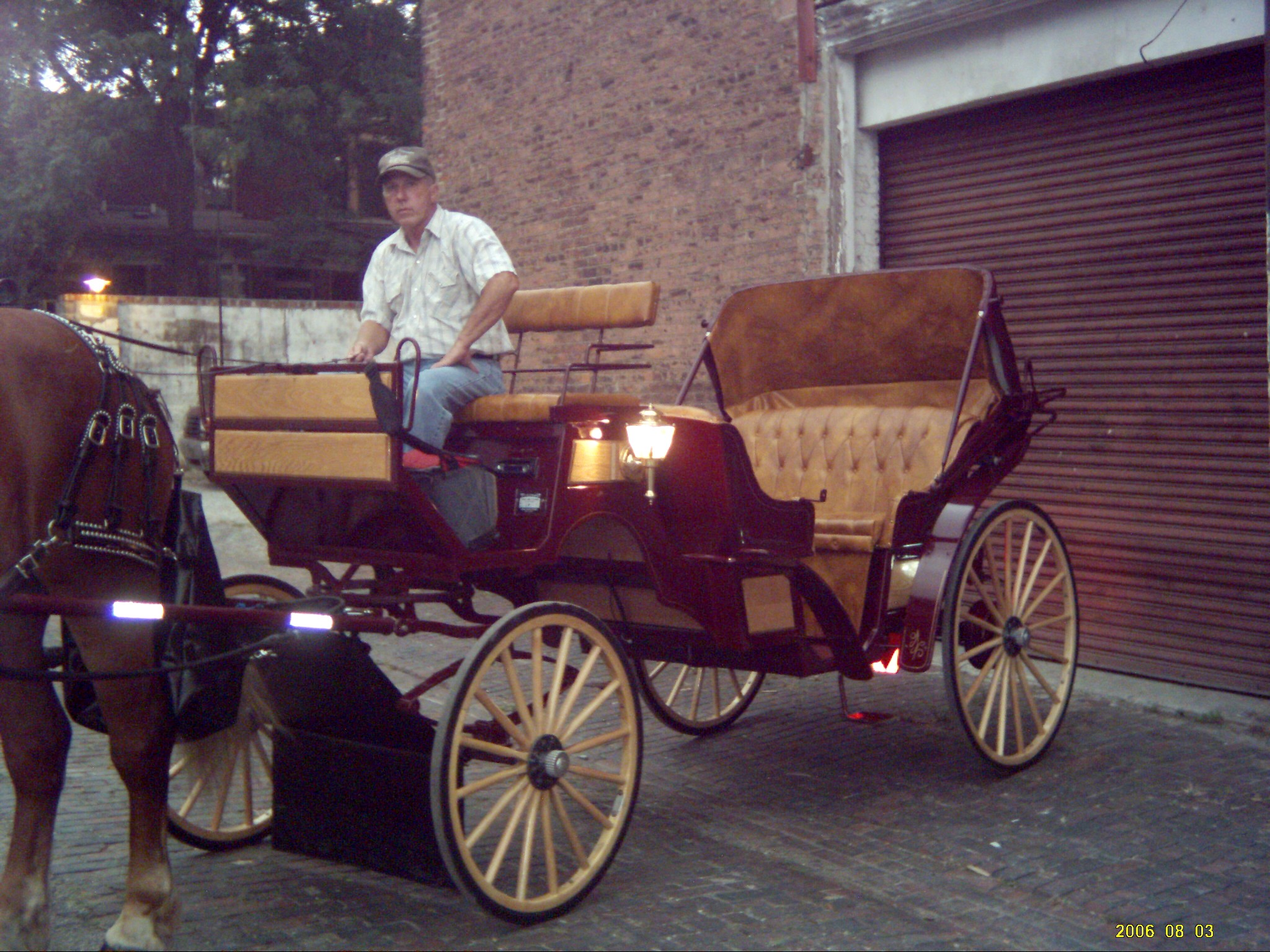 Stricking burgundy and tan wedding carriage used in Cincinnati Ohio - OH, Covington Kentucky - KY, Newport Kentucky - KY and surrounding areas